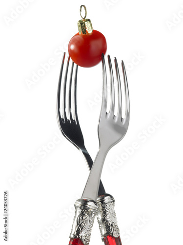 Photo: two forks with red christmas decoration two forks with red christmas decoration