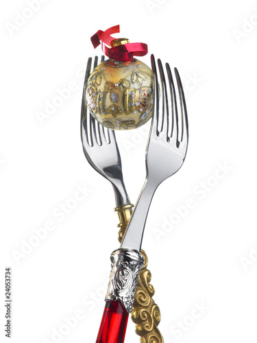 Photo: two forks with christmas decoration two forks with christmas decoration