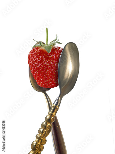 Photo: two spoons with strawberry two spoons with strawberry