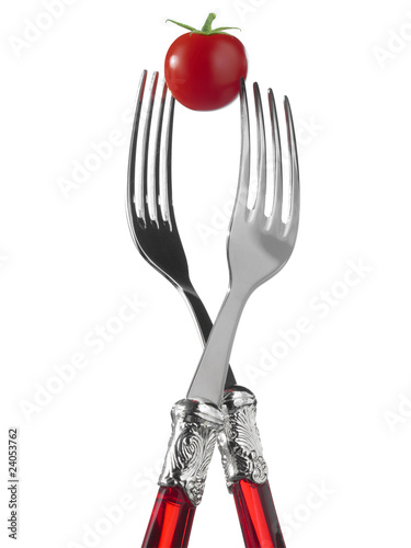 Photo: two forks with cherry tomato two forks with cherry tomato