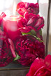 peonies and candle