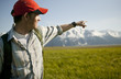 Man pointing in remote valley