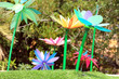 Tropical garden with plastic flowers Spain