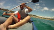 Man paddling in Kayak on the sea