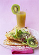 pancake with melted chocolate and kiwi