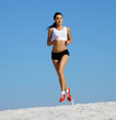 girl runs on sand
