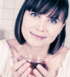 young woman, enjoying a cup of coffee