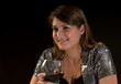 Foto: Pretty young woman with red wine, on a date Pretty young woman with red wine, on a date