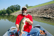 fisherman with bass
