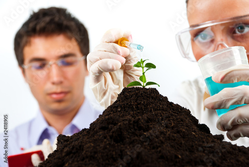 Photo: Biologists making an experiment in labor Biologists making an experiment in labor