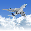 Photo: airplane flying over the clouds after takeoff airplane flying over the clouds after takeoff