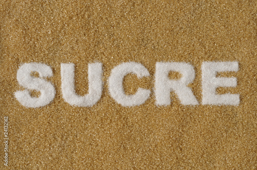 Photo: the wordsucre written with white sugar on brown sugar the wordsucre written with white sugar on brown sugar