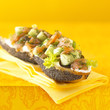 tartare salmon,cucumber and horseradish sauce on poppy seed baguette bread