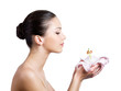 Beautiful young Woman with flower in profile Beautiful young Woman with flower in profile