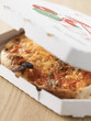 pizza in it's carton box