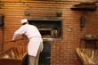 baker infront of his oven