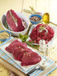assorted pieces of raw beef