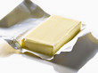 slab of butter in it's wrapping