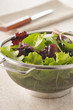 colander full of mesclun