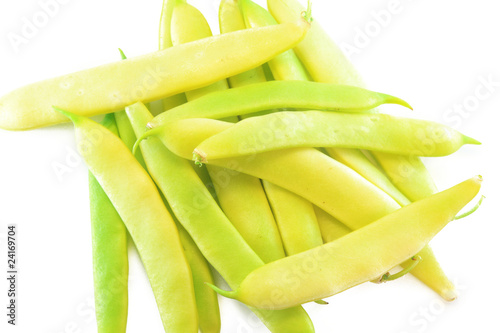 Photo: Pile of yellow wax bean pods isolated on the white background Pile of yellow wax bean pods isolated on the white background