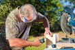 Man Uses a Nail Gun Man Uses a Nail Gun