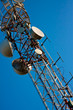 Telecommunications tower with blue background