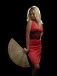 Hot blonde in red dress with fan