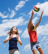 girls playing volleyball