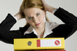 portrait of businesswoman with folders