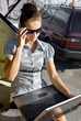 Foto: woman has a fan with laptop computer woman has a fan with laptop computer