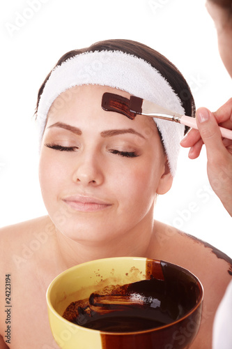 Photo: Girl having chocolate facial mask. Girl having chocolate facial mask.