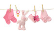 Pink baby goods hanging on the clothesline Pink baby goods hanging on the clothesline
