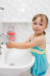 little girl in bathroom