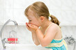 little girl in bathroom