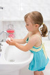 little girl in bathroom