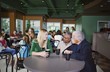 People Chatting In Cafe