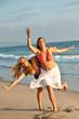 Photo: beautiful woman on California beach coast beautiful woman on California beach coast