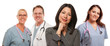 Hispanic Woman with Male and Female Doctor or Nurse