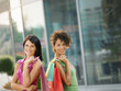 friends with shopping bags