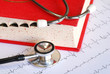 Medical stethoscope on an EKG chart