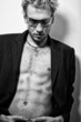 BW portrait of handsome blond man in sunglasses