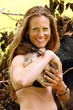Young woman and south american python