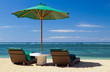 Two chairs and umbrella