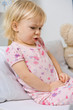little girl in bed witch stomackache