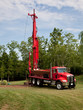 Drilling geothermal well in yard