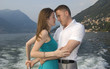 Loving couple by a boat