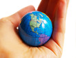 Earth globus in hand