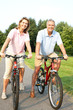 senior couple cycling