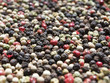 red, white, green and black peppercorns
