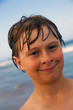 smiling happy boy at the beach